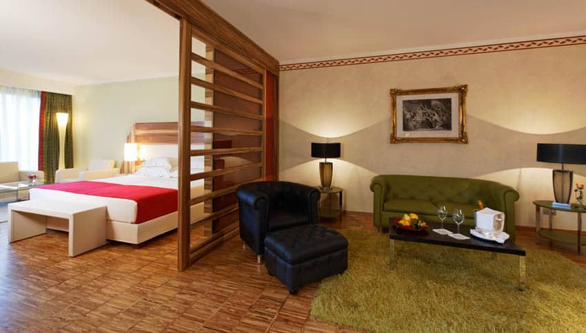 lefay-resort-exclusive-suite-bedroom