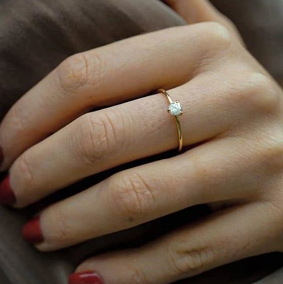 Akind diamond ring